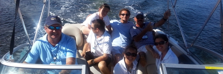 Group aboard a Chaparral 21' H20