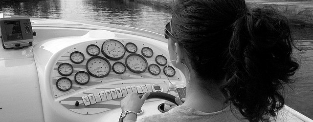 Woman driving a boat